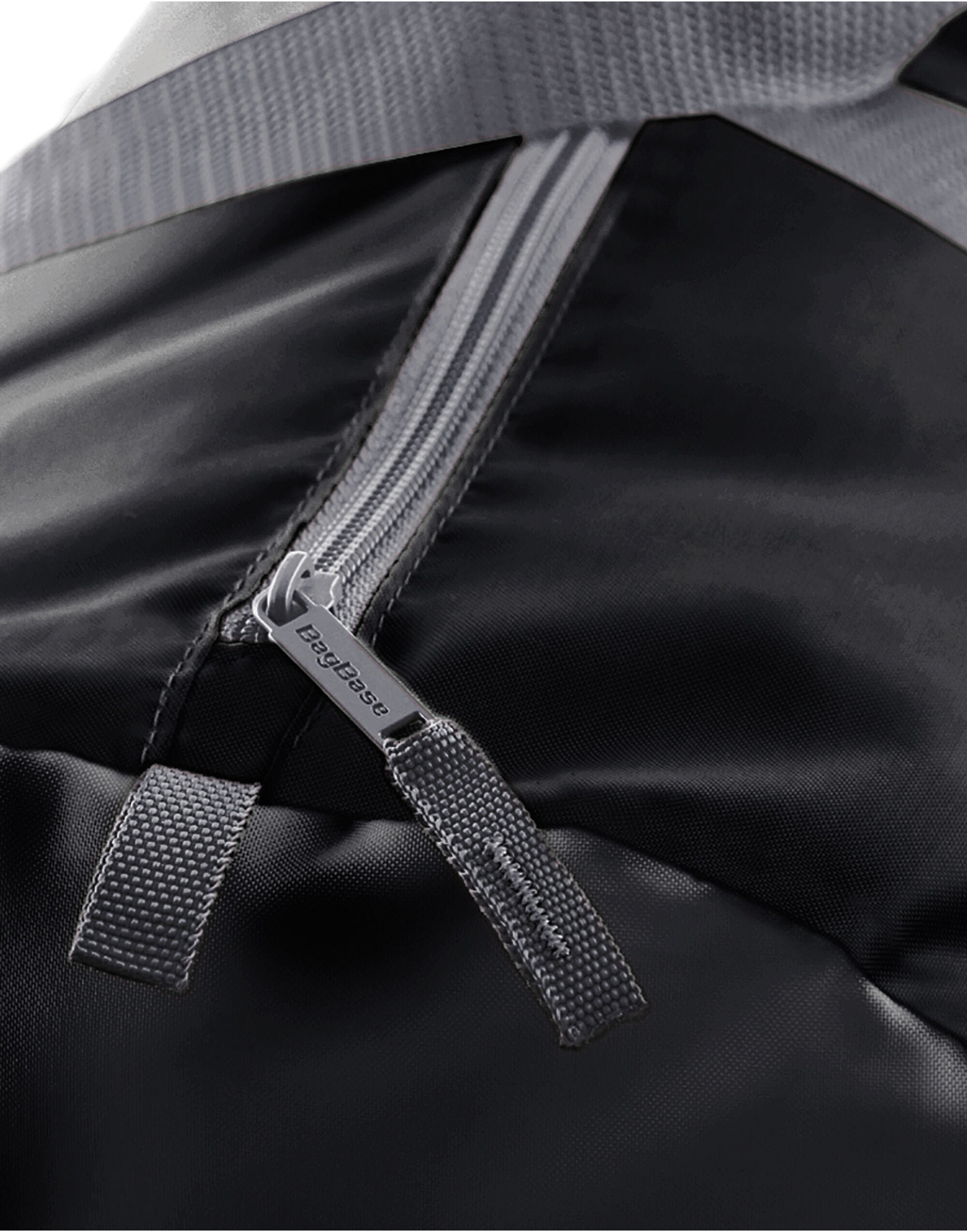 Close-up of the textured material on the black travel set.