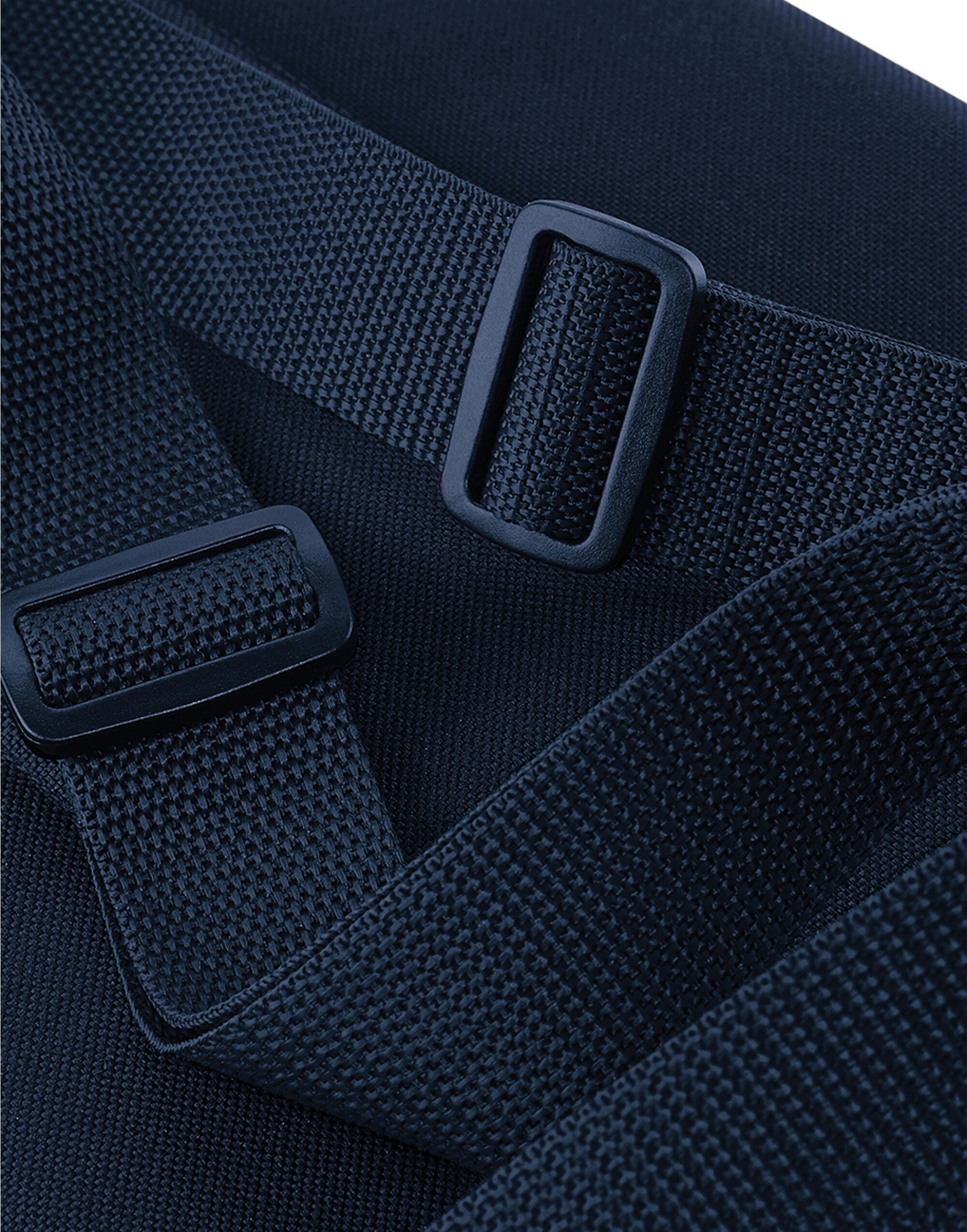 Side view of the black weekender showing its capacity.