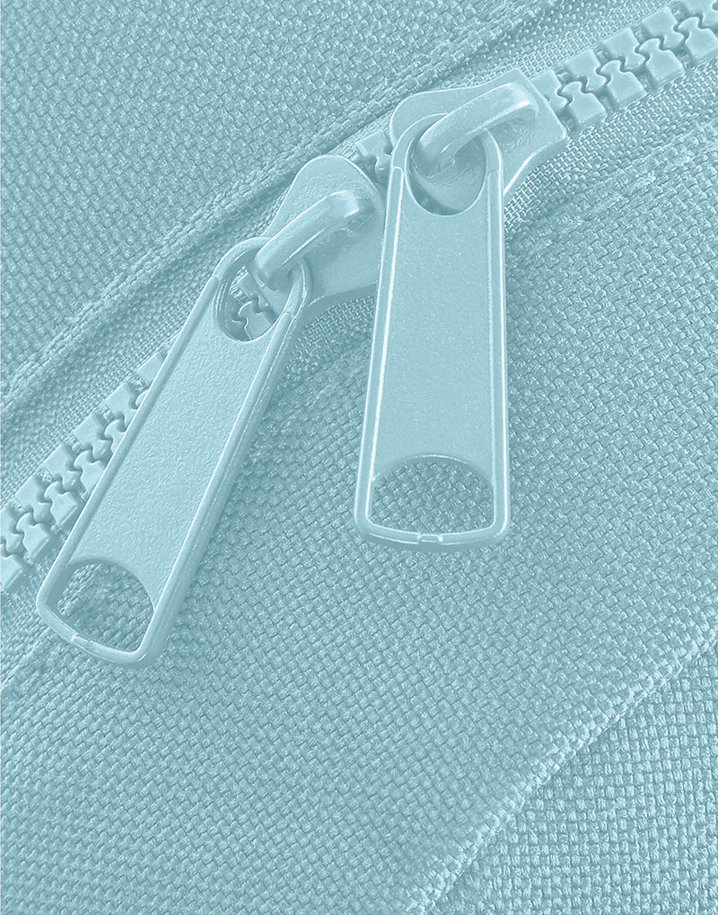 Close-up of the recycled fabric on the navy barrel bag.