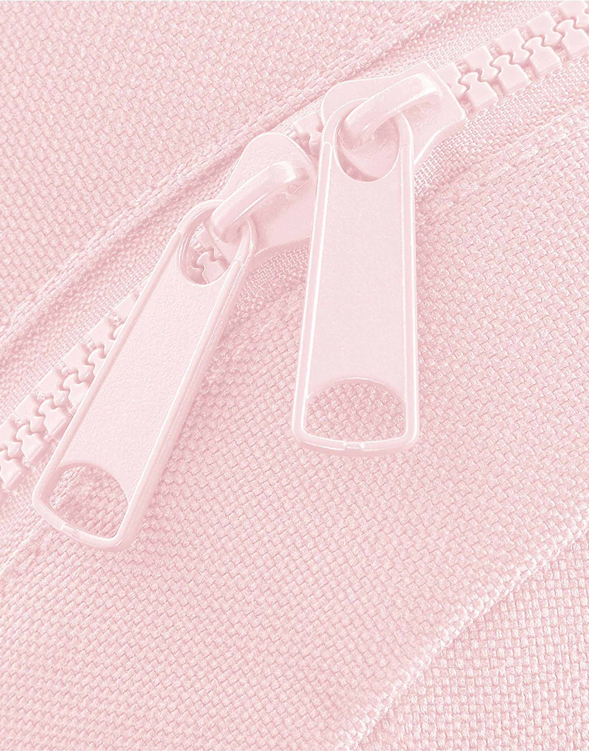 Interior view of the black mini accessory case with zip pockets.