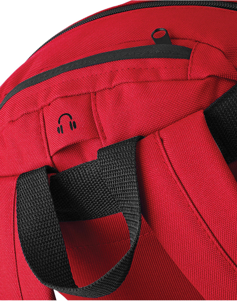 A yellow recycled roll-top backpack with buckle closure.