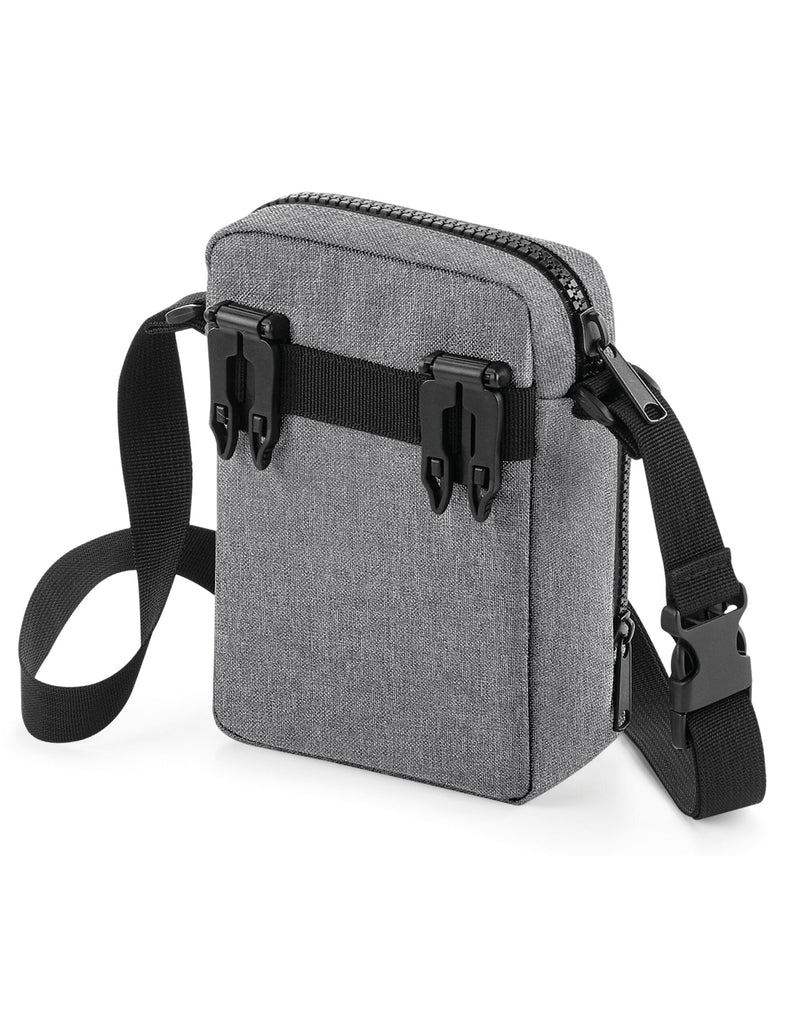 The oyster-colored travel case showing items through the clear panel.