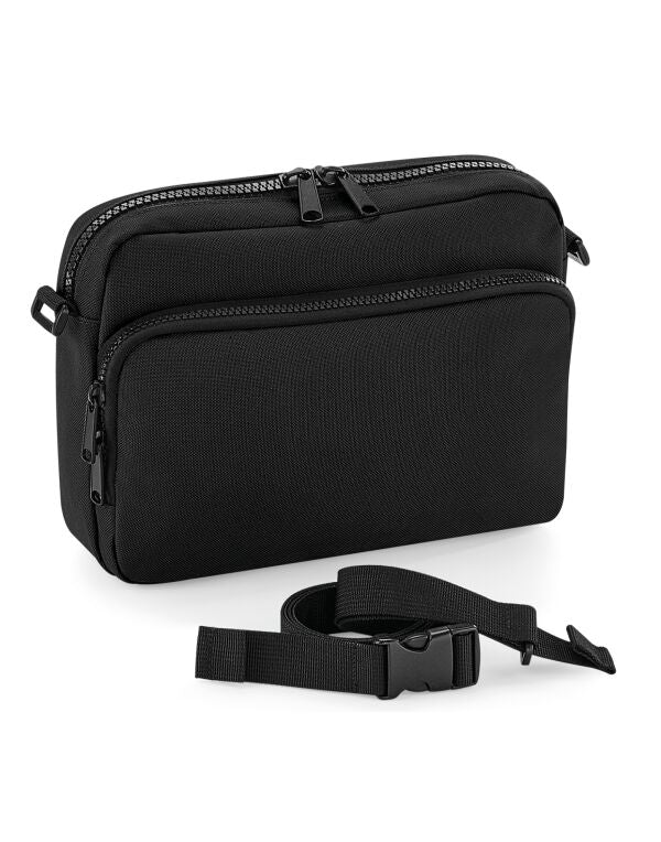 A soft pink travel case with a transparent top.
