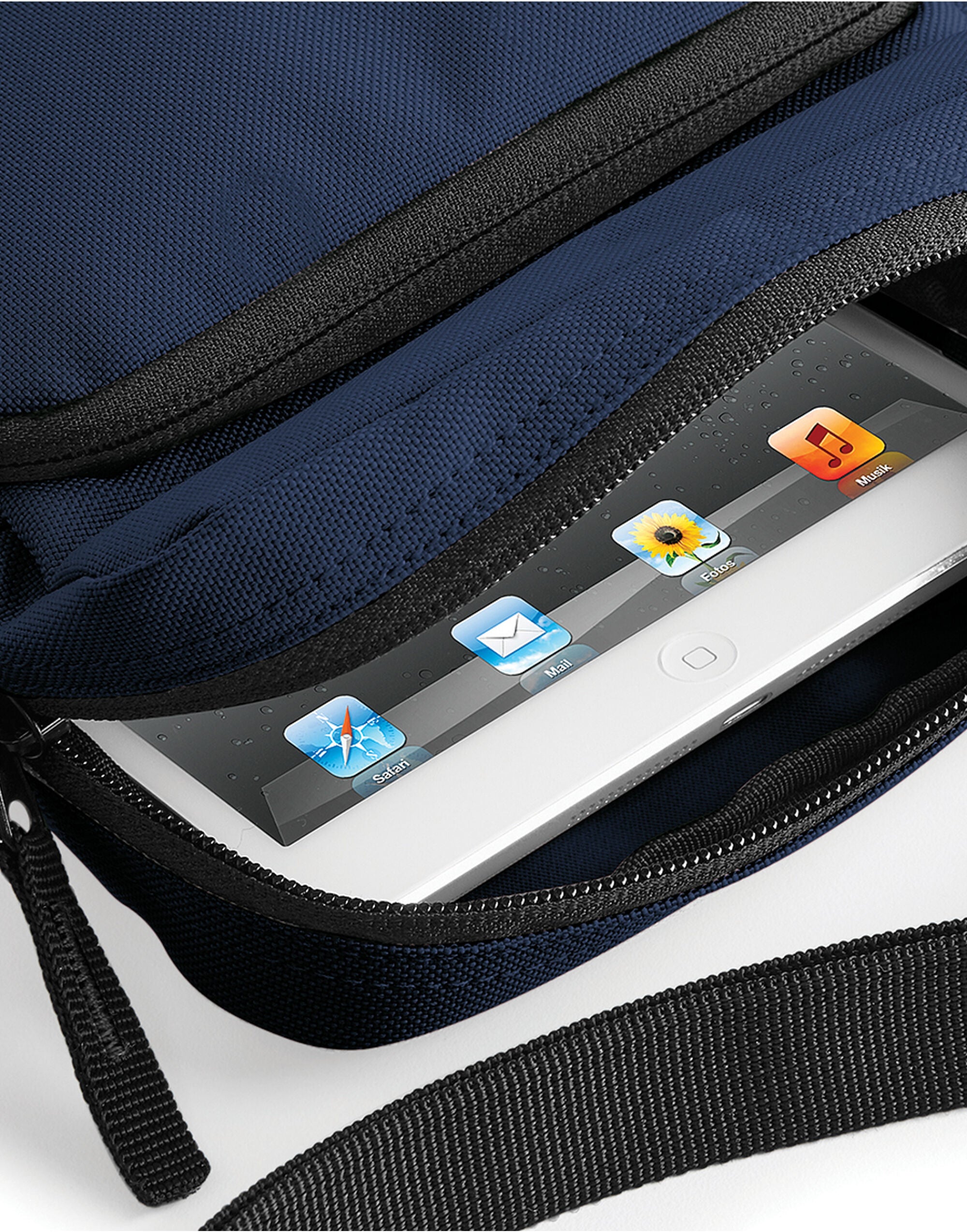 Rear view of the graphite navy blue across-body bag.