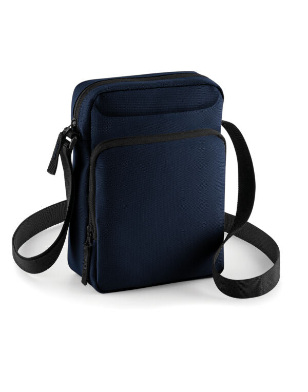 Classic navy blue across-body bag with adjustable shoulder strap.