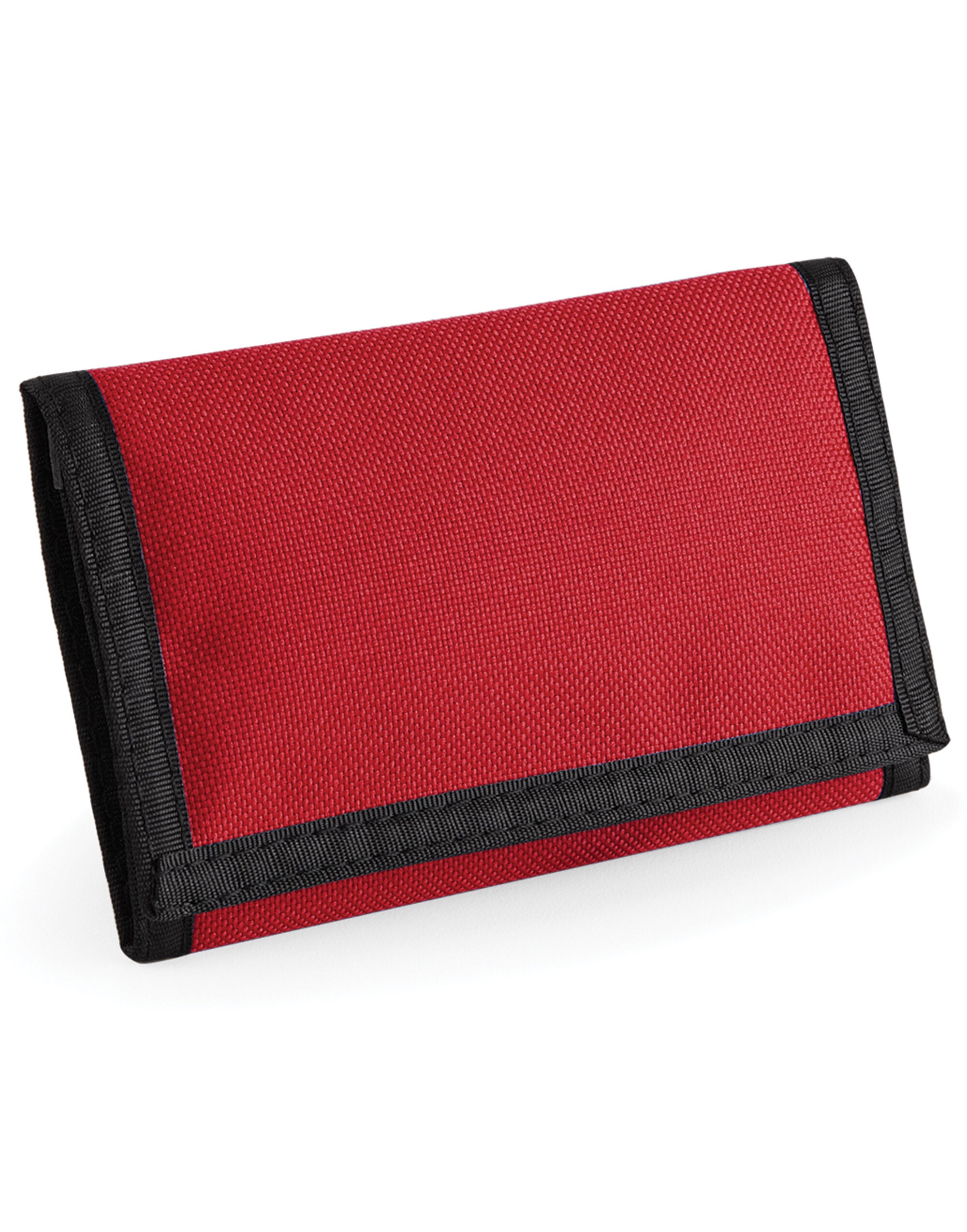 A hand holding the compact soft grey mini accessory case.