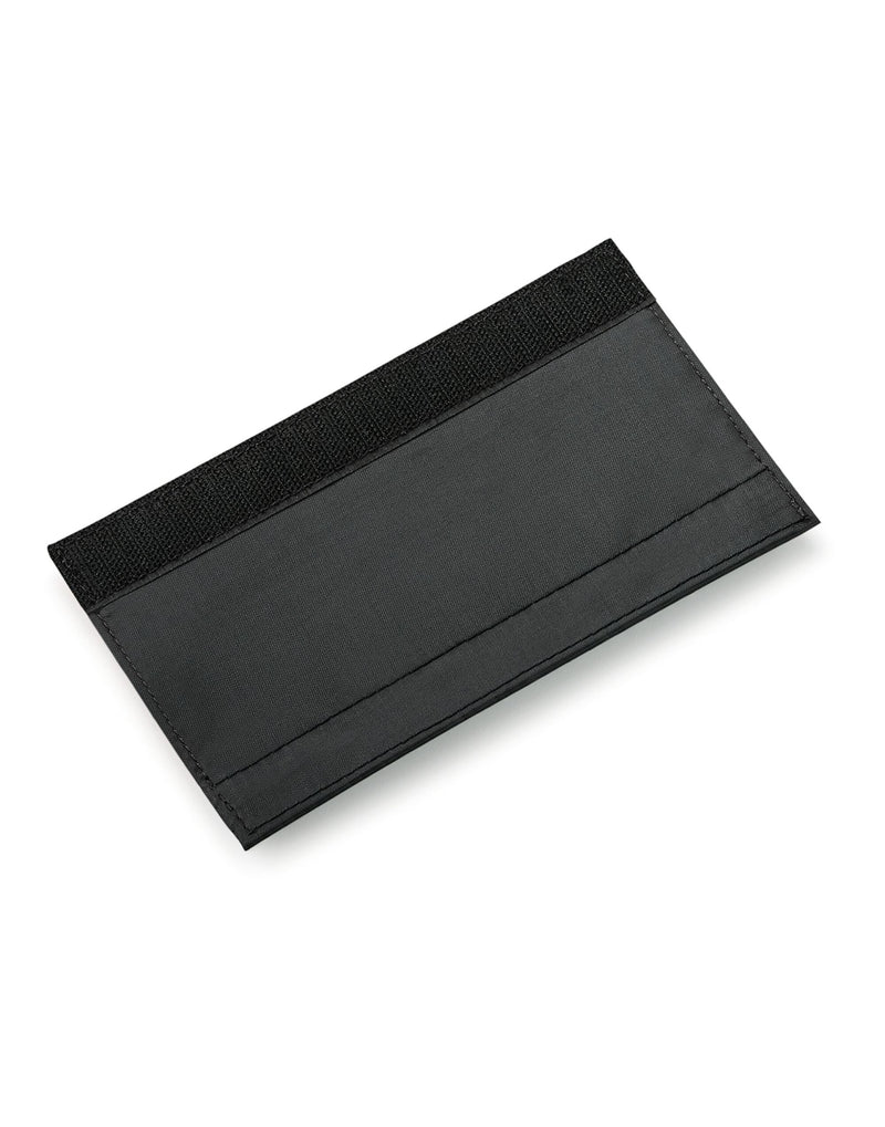 The black Bagbase Escape Handle Wrap, designed to provide a comfortable grip for luggage handles.