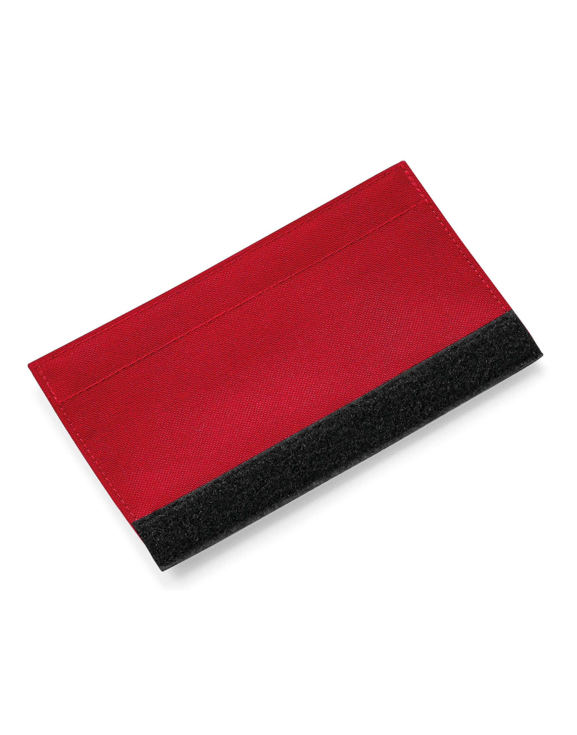 Detail of the velcro fastening on the Bagbase Escape Handle Wrap, ensuring a tight and secure fit.