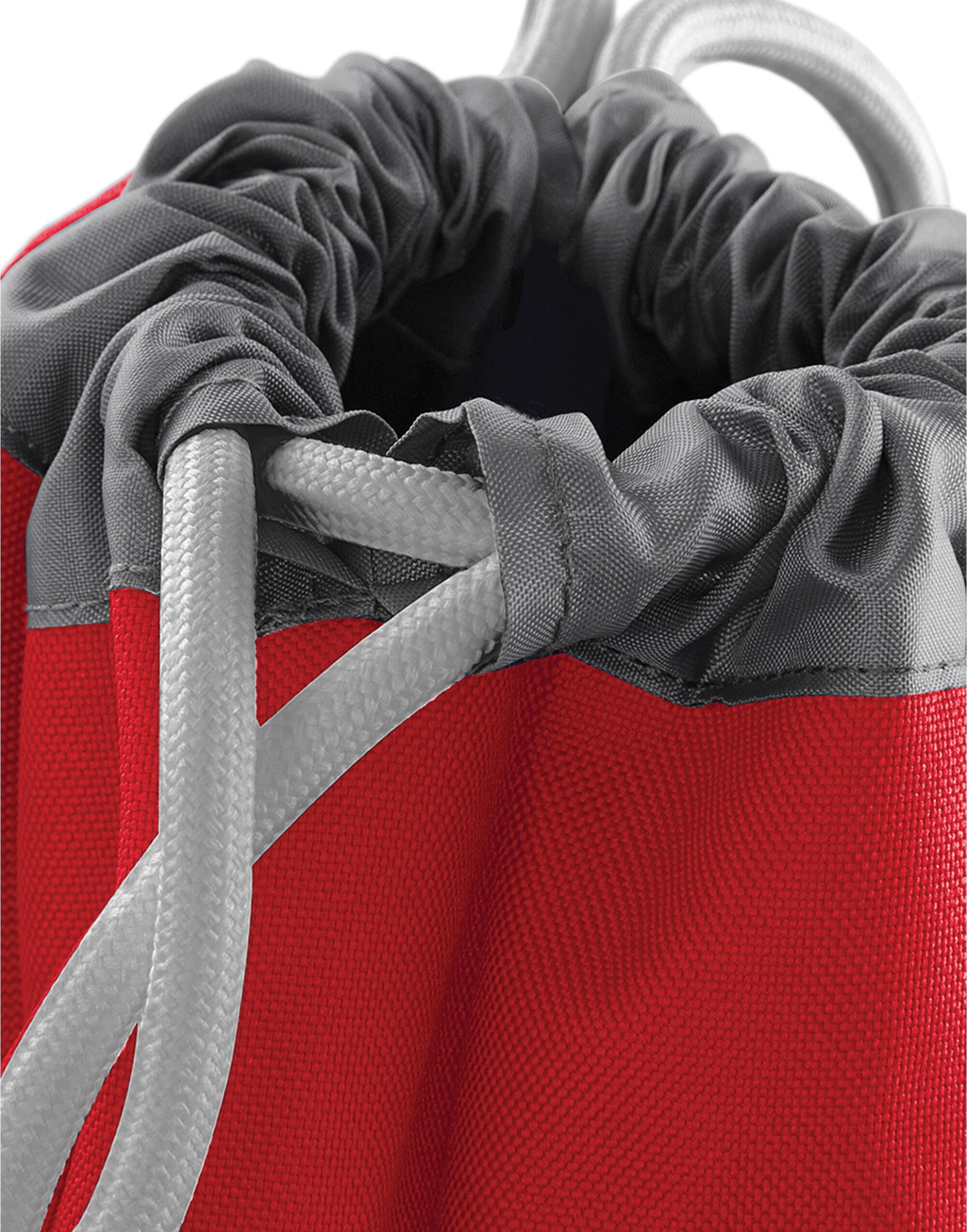 A person wearing the black Bagbase Athleisure Gymsac, demonstrating its practical size and stylish fit.