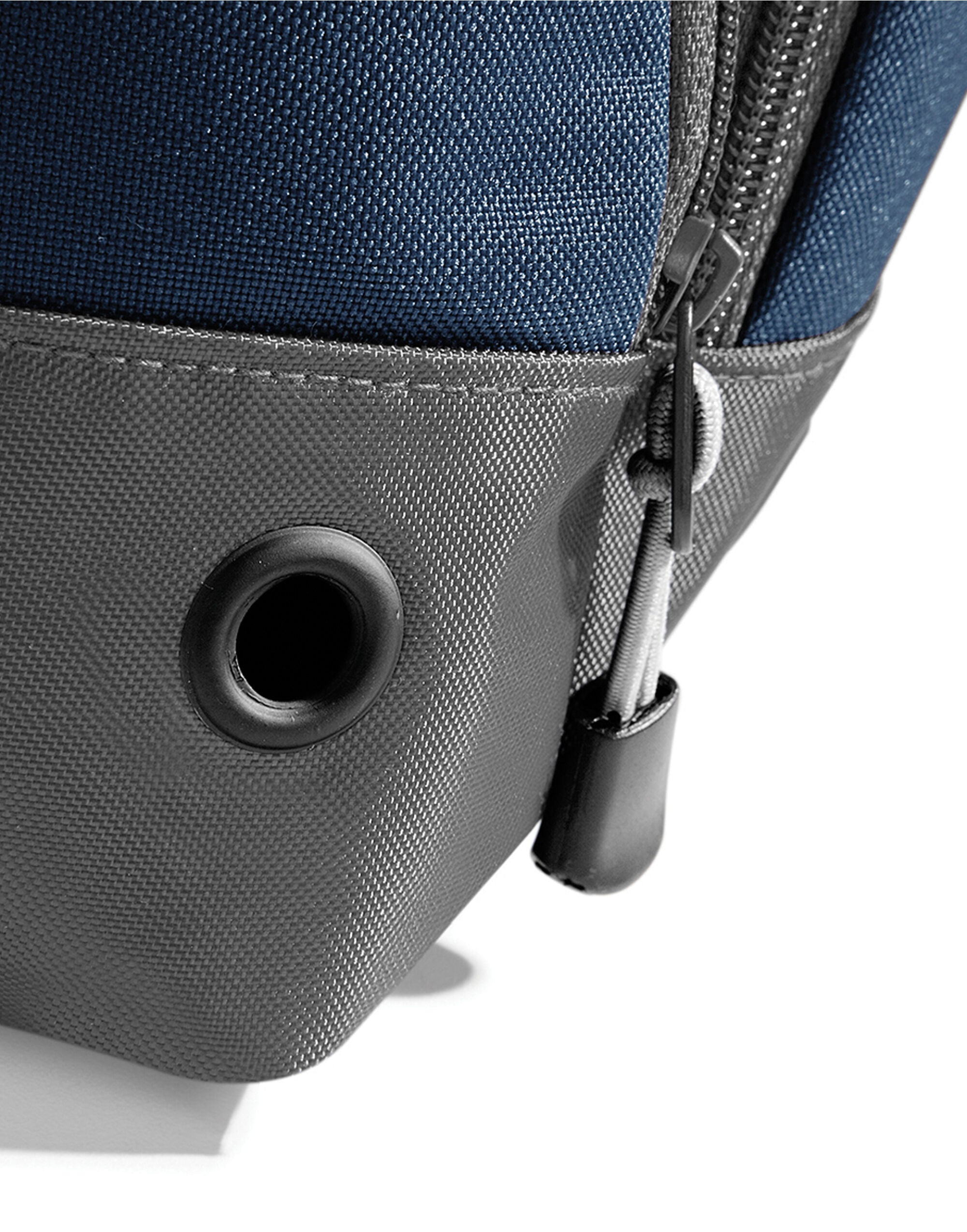 The black Bagbase Athleisure Holdall's zippered end compartment, ideal for separating items.