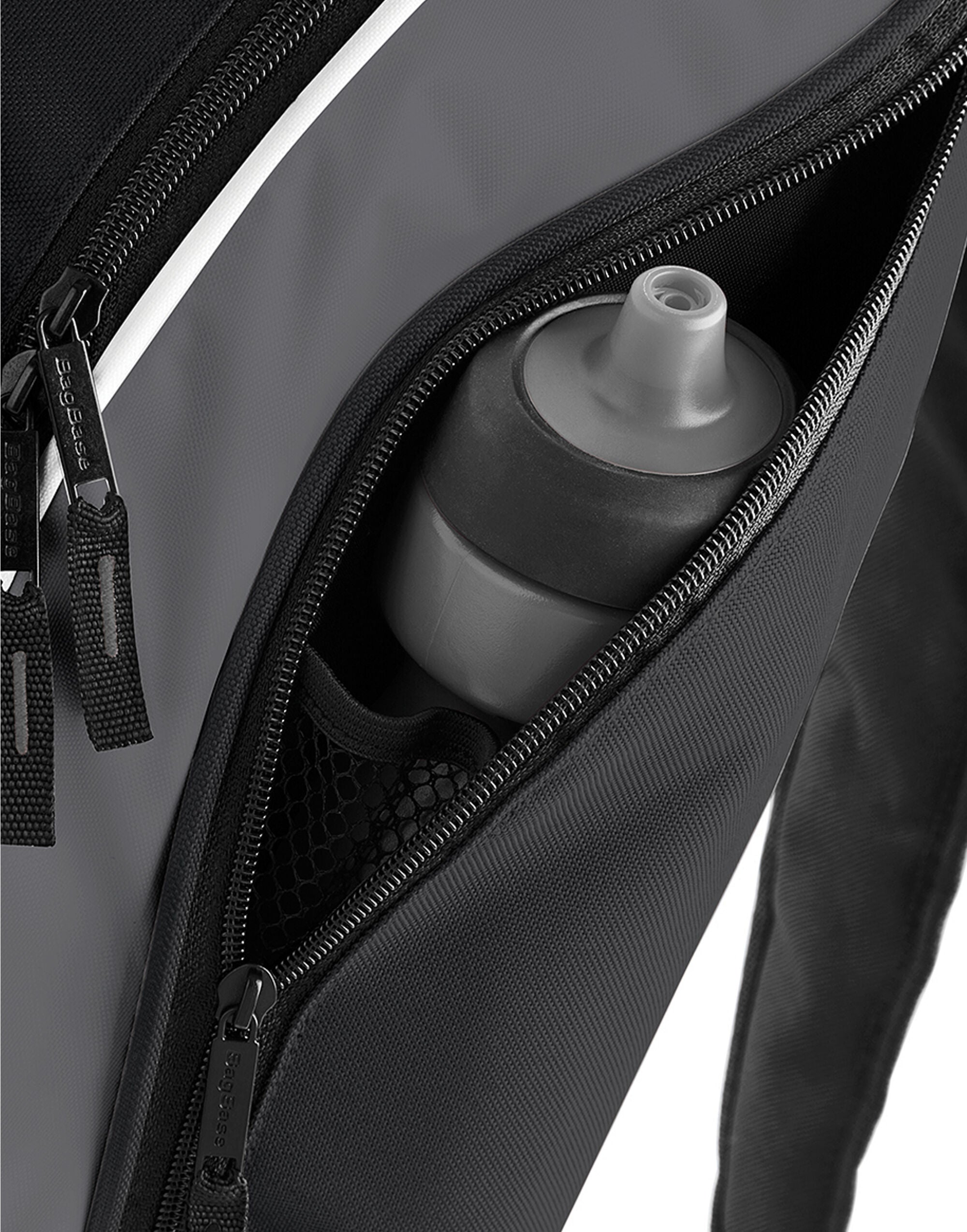 Three-quarter view of the royal blue Bagbase Teamwear Backpack on a white background.