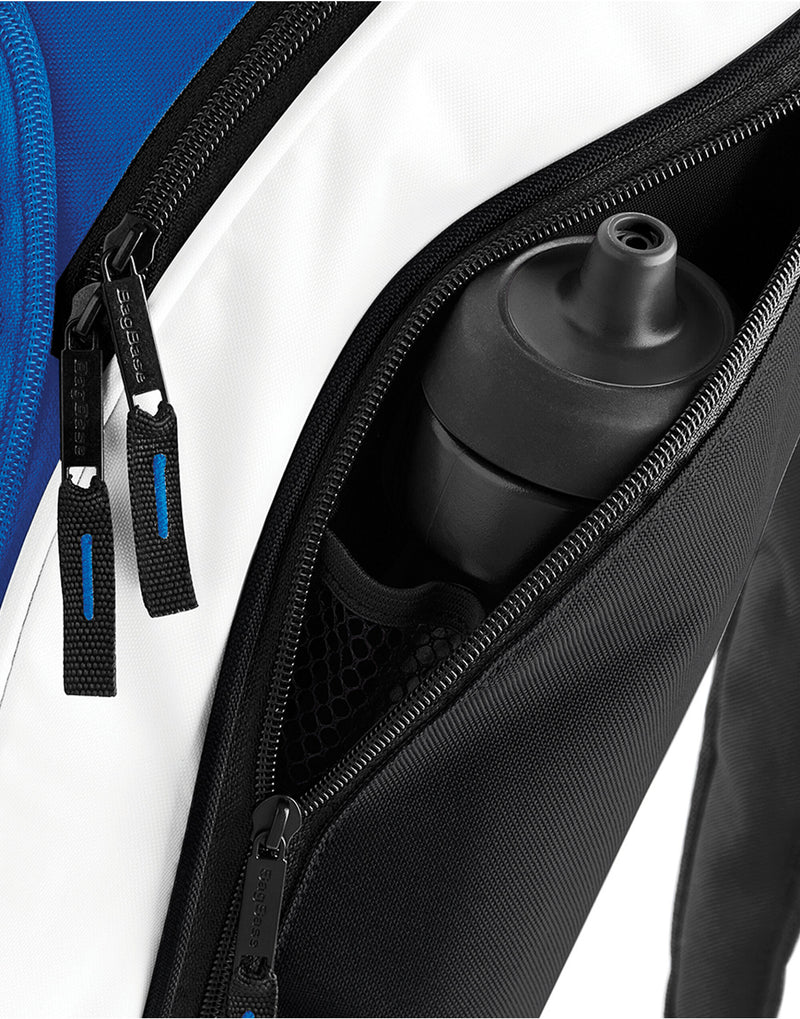 Close-up of the sturdy zipper pulls on the main compartment of the Bagbase Teamwear Backpack.