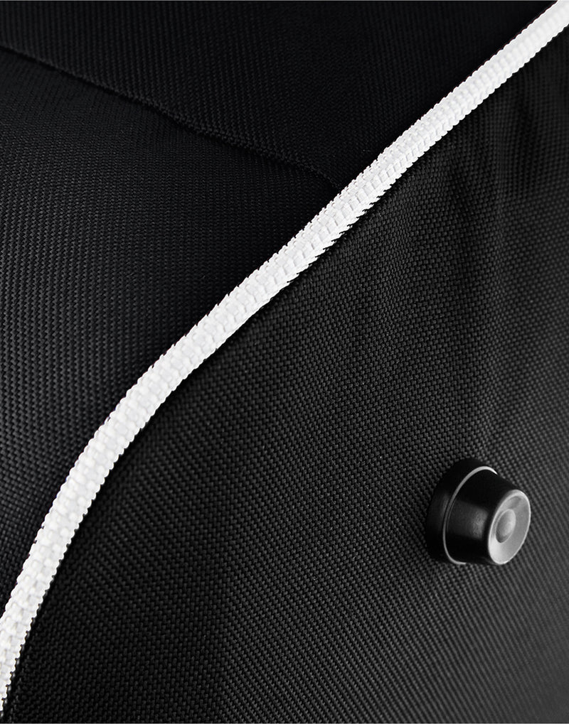 Interior shot of the red Bagbase Teamwear Holdall, revealing its large capacity for equipment and clothing.