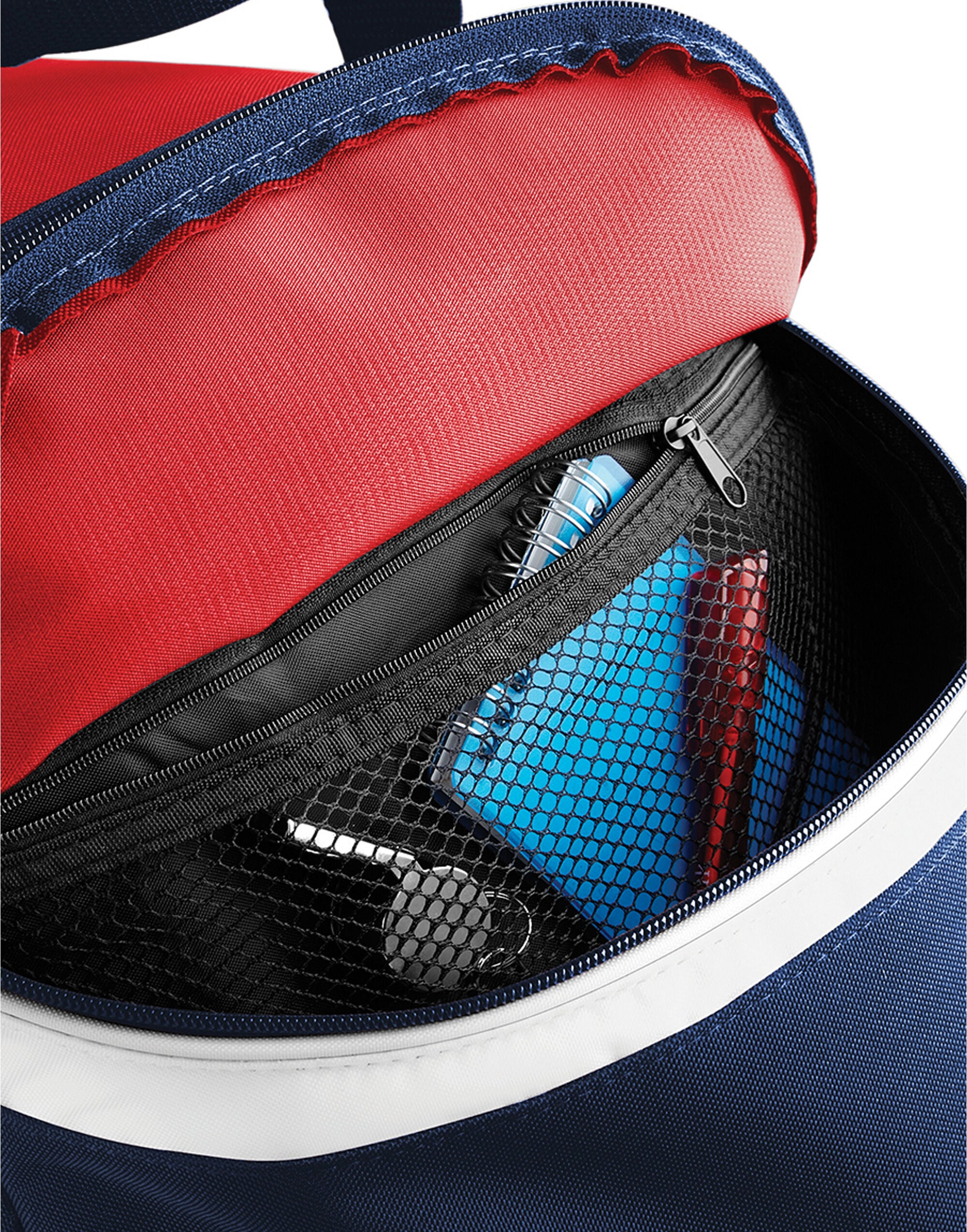 The bright red Bagbase Teamwear Holdall, shown from a low angle to highlight its size.
