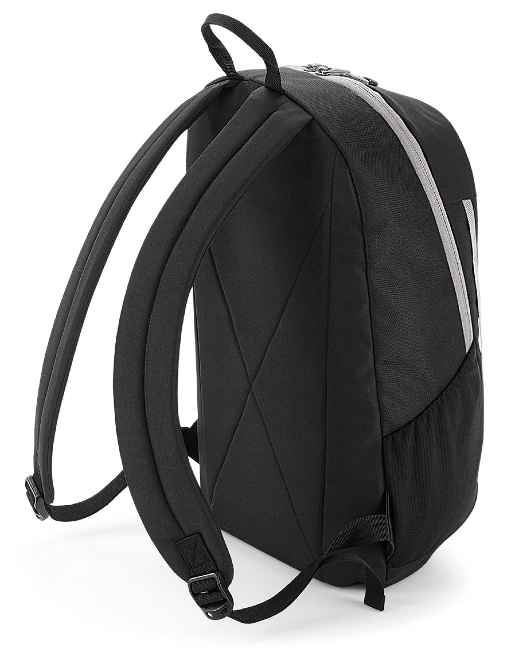 Side profile of the Bagbase Urban Trail Pack, highlighting its compression straps and mesh side pocket.
