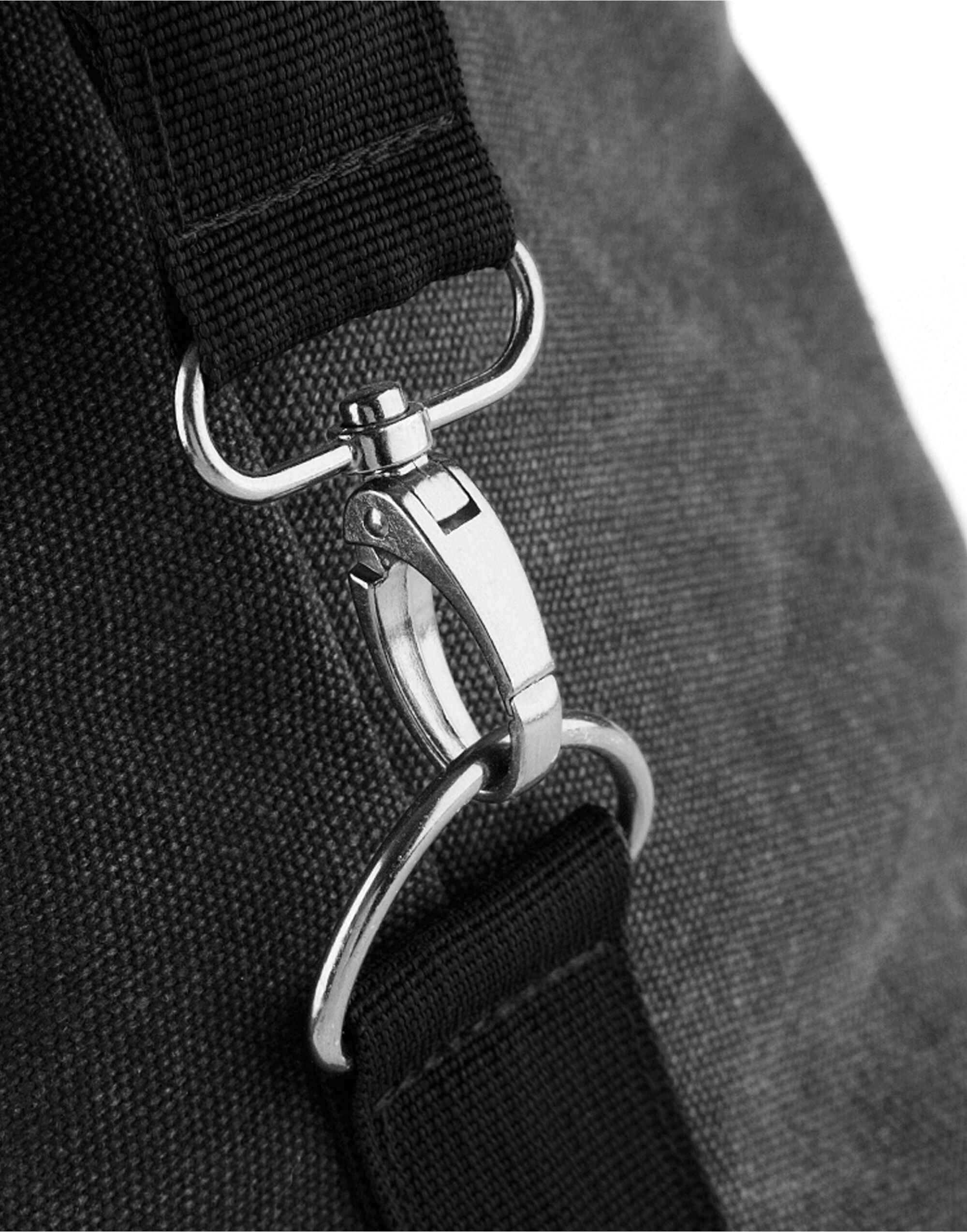 Side profile of the black Bagbase Vintage Canvas Weekender, showing its full length and carry handles.