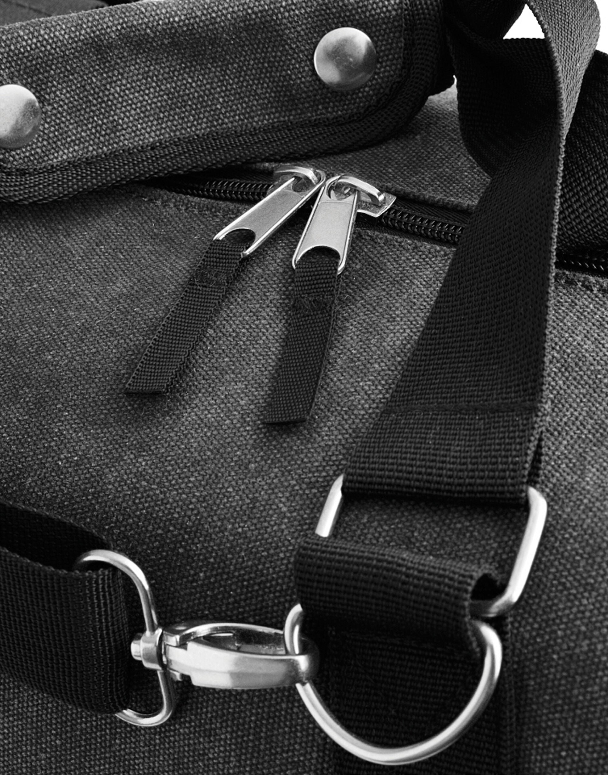 The navy Bagbase Vintage Canvas Weekender, a stylish and durable bag perfect for getaways.
