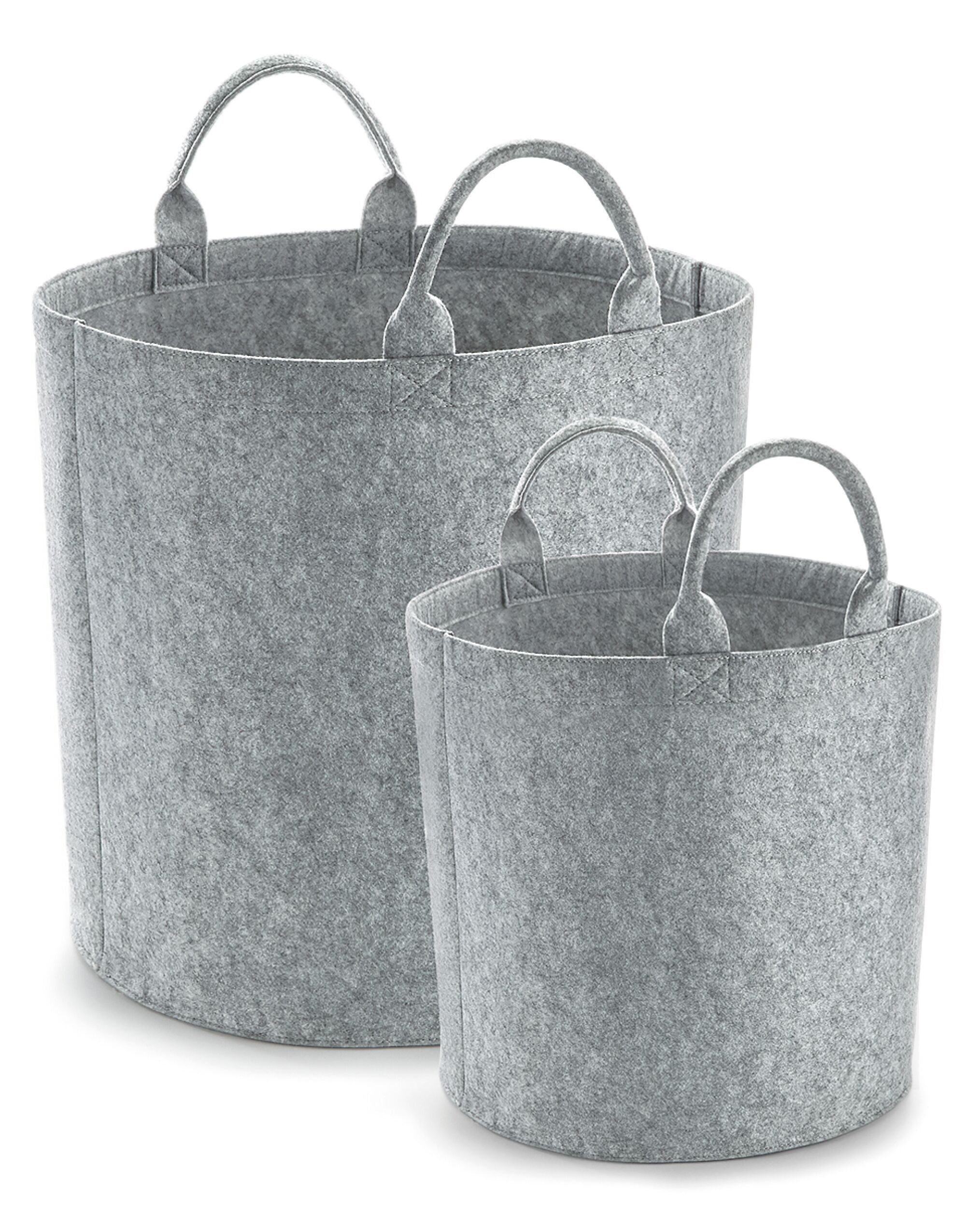 A person carrying the large Felt Trug to demonstrate its size and portability.