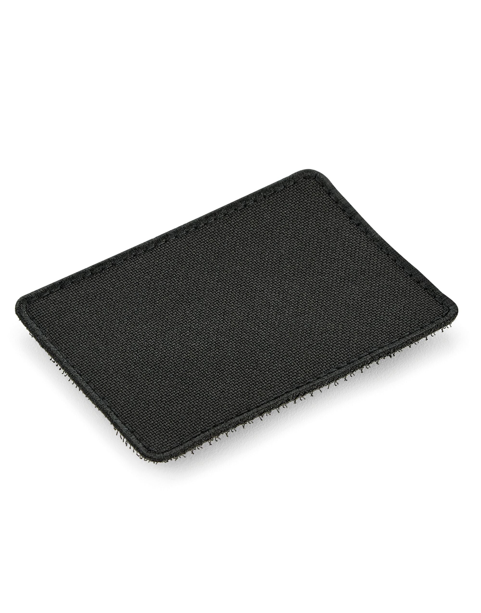 Grey MOLLE utility patch, front view.