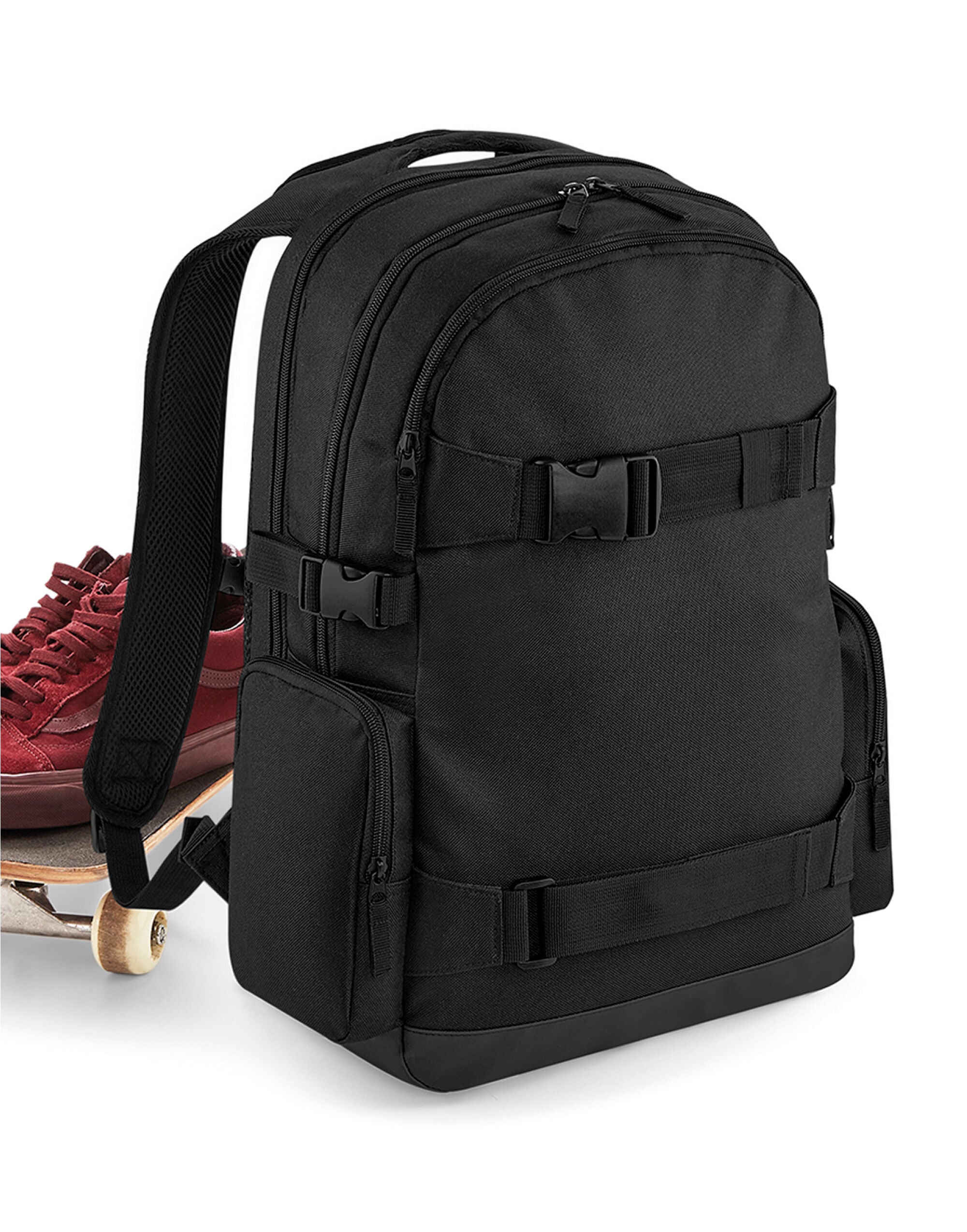 Front view of the Bagbase Old School Boardpack in black, featuring buckle straps for skateboard and a top carry handle.