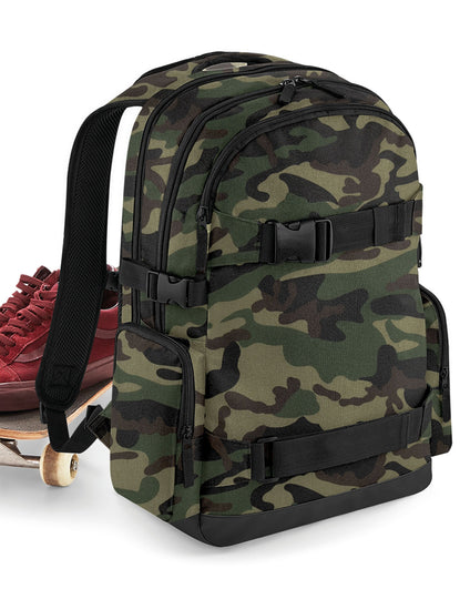 Side profile of the Bagbase Old School Boardpack, showing the padded shoulder straps and side mesh pocket.