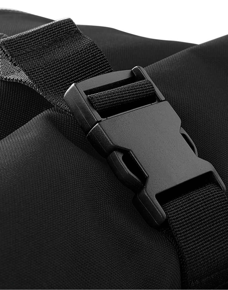 The Bagbase Roll-Top Backpack in a heather grey, shown with its top unrolled to reveal maximum capacity.