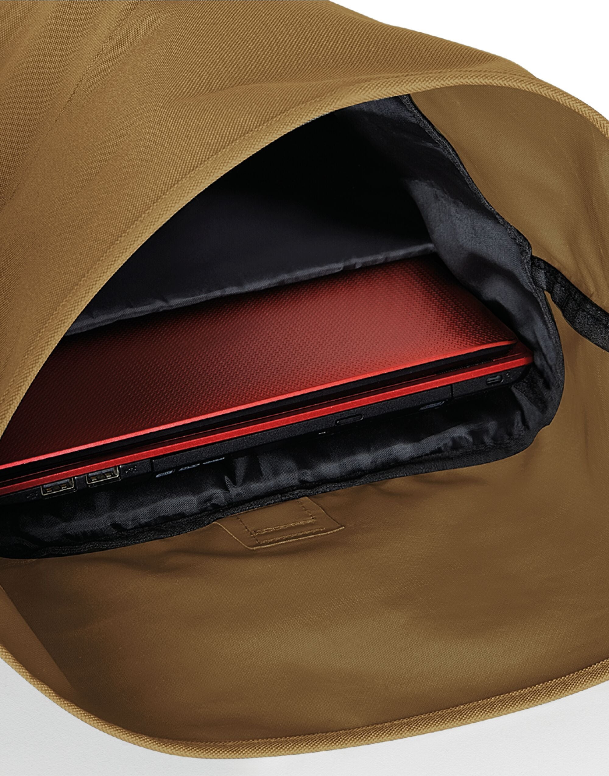 Three-quarter view of the classic black Bagbase Roll-Top Backpack against a clean white background.