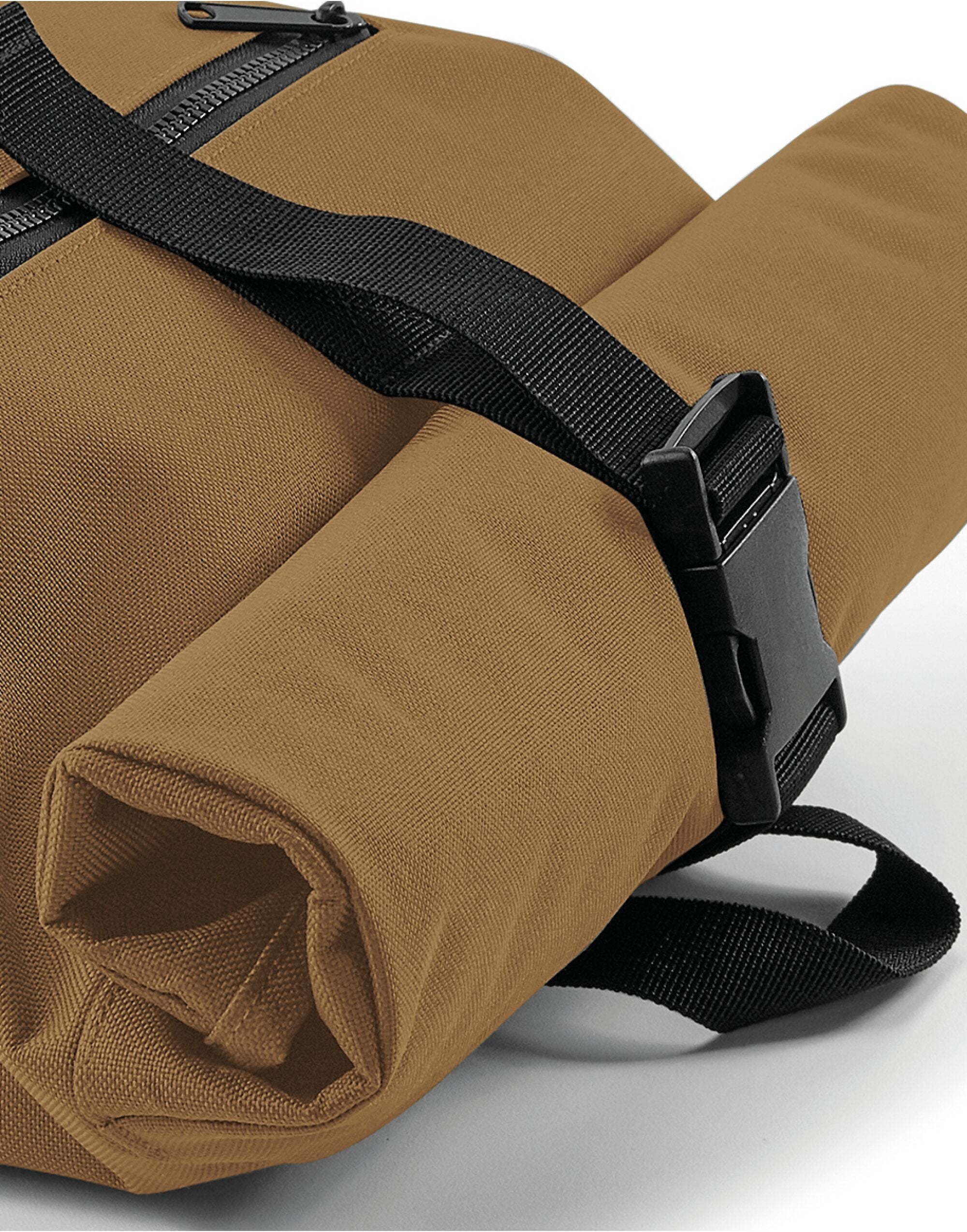 Studio shot of the navy Bagbase Roll-Top Backpack, emphasizing its durable construction and modern look.
