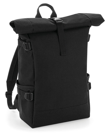Front view of the Bagbase Block Roll-Top Backpack in black and grey, featuring a distinct color-block design.