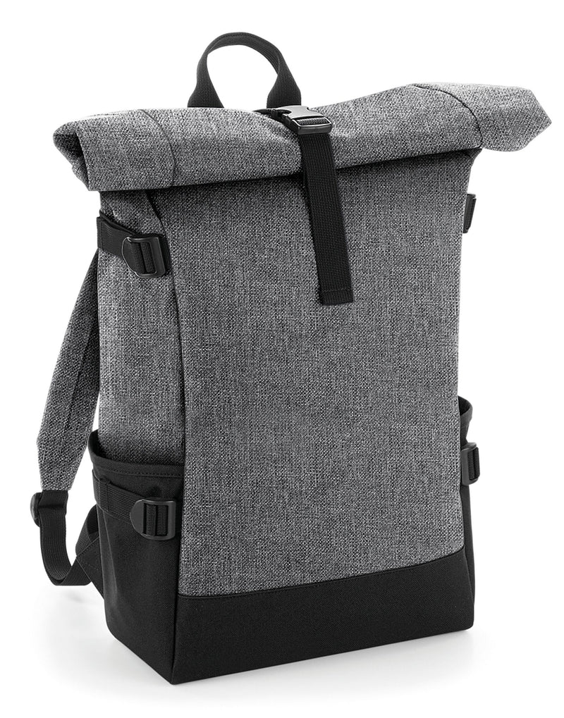 Detail shot of the Bagbase Block Roll-Top Backpack's sturdy material and secure clip fastening.