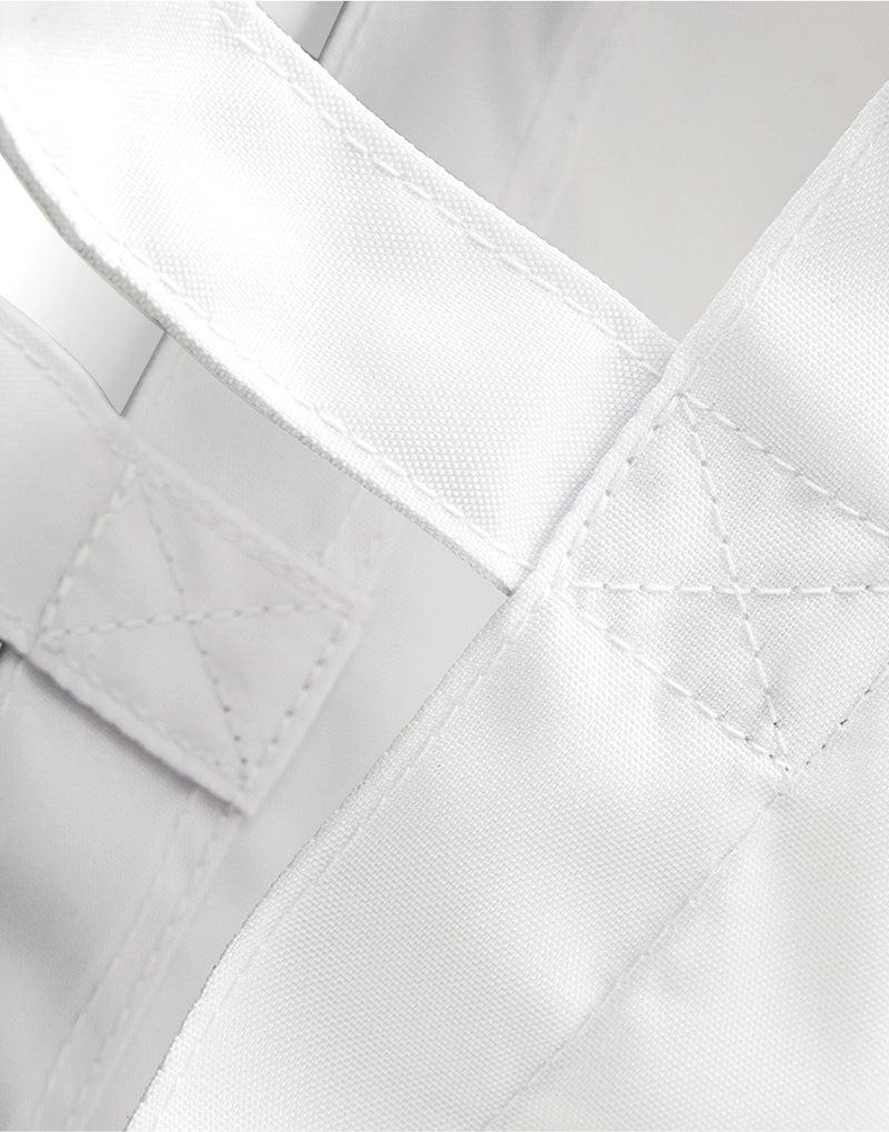 Close-up on the polyester sublimation panel of the Bagbase Shopper, ensuring a vibrant and clear print.