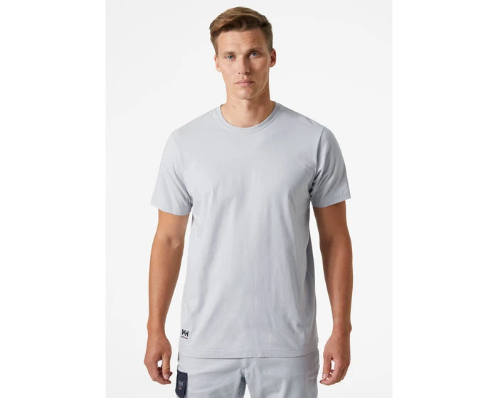 man wearing a white Helly Hansen Manchester T-Shirt 