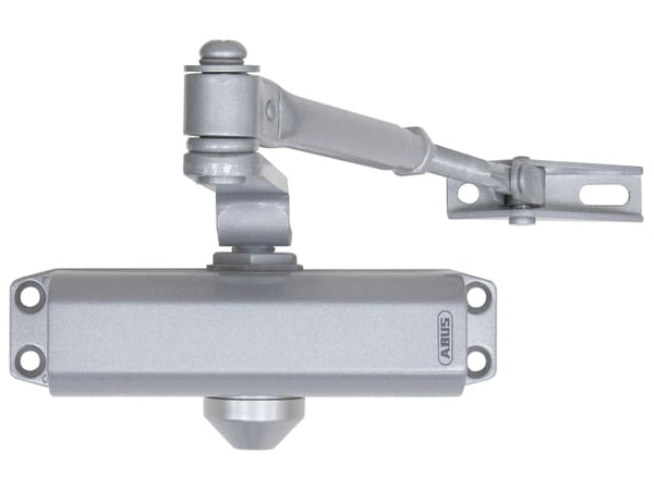 Silver ABUS AC4223 overhead door closer for controlled, quiet door closing in commercial settings.