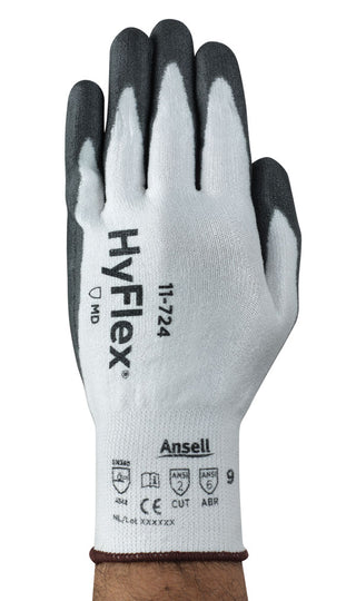 Grey and white Ansell HyFlex 11-724 cut resistant glove, angled view.