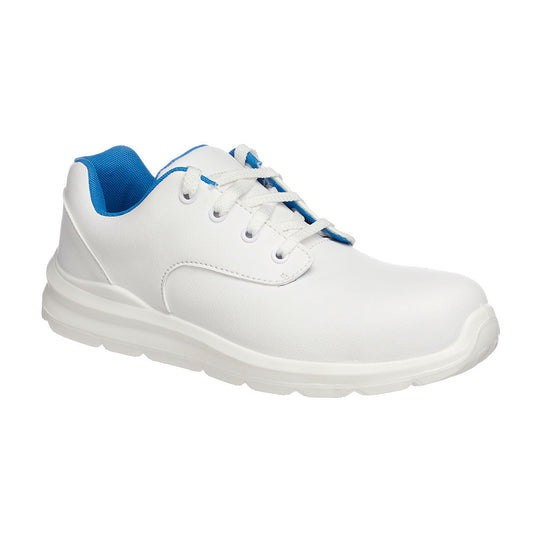 White laced safety shoe with composite toe and slip-resistant sole for hygienic environments.