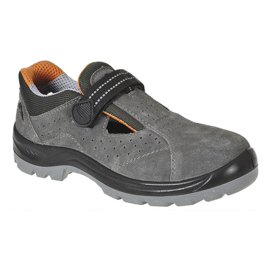 Grey safety sandal with perforated design, adjustable strap, and reinforced toe.