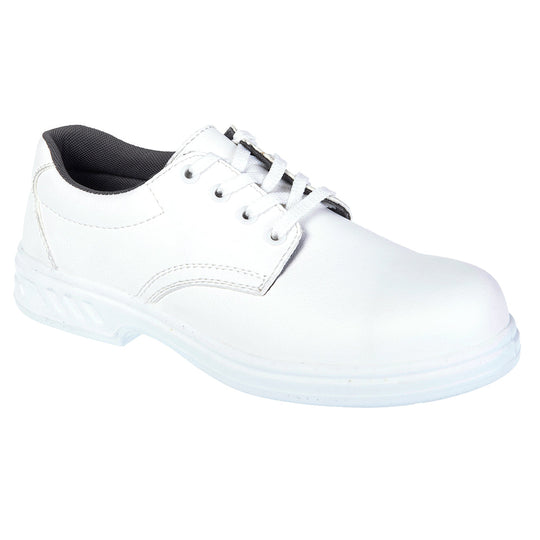 White laced safety shoe with clean design and reinforced toe for hygiene-sensitive areas.