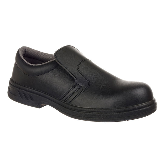Black slip-on safety shoe with elastic sides and protective toe for easy, secure fit.