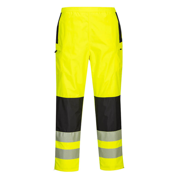 Model wearing the PW3 Hi-Vis Women's Rain Trouser with a matching jacket.